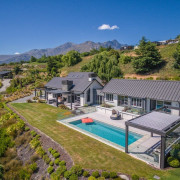 The word ‘relax’ comes to mind with this aerial photography, bird's eye view, cottage, estate, home, house, land lot, mansion, property, real estate, residential area, suburb, villa, brown