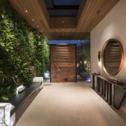 The green wall creates a dramatic entranceway - architecture, ceiling, estate, home, house, interior design, lighting, property, real estate, brown