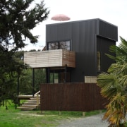 Graham Phipps-Black – Ruby Bay, Nelson house - architecture, cottage, facade, home, house, property, real estate, tree, black, brown