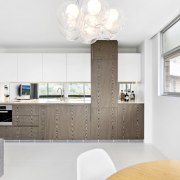 Wood panels on these cabinets break up the architecture, home, interior design, interior designer, living room, product design, white