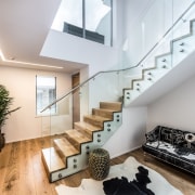 Find out more apartment, architecture, ceiling, daylighting, handrail, house, interior design, living room, loft, property, real estate, stairs, gray