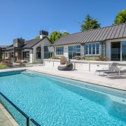 The word ‘relax’ comes to mind with this cottage, estate, home, house, leisure, property, real estate, resort, swimming pool, villa, teal