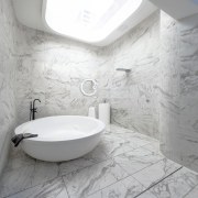 Marble runs across the floor – and up bathroom, bathroom sink, bidet, ceramic, floor, flooring, interior design, plumbing fixture, product design, room, sink, tap, tile, toilet seat, wall, gray, white