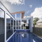 While it may seem quite open, the home architecture, daylighting, estate, home, house, property, real estate, residential area, roof, window, gray