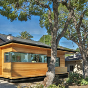 It's almost as if the architect has peeled architecture, cottage, home, house, property, real estate, tree