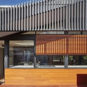 Slats add detail and throw interesting shadows - architecture, building, commercial building, facade, mixed use, real estate, black