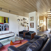 Art is the centrepiece in this living space ceiling, house, interior design, living room, loft, property, real estate, room, gray