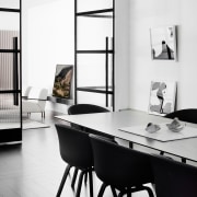 The dining area with angled mirrors - The black and white, chair, furniture, interior design, product design, shelf, shelving, table, white