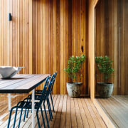 A timber deck stands apart from the walls architecture, deck, floor, hardwood, home, house, interior design, real estate, siding, wood, wood flooring, wood stain, brown, orange