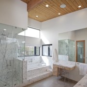 The wood ceilings carry through to the bathroom architecture, bathroom, ceiling, daylighting, estate, floor, flooring, home, house, interior design, room, tile, gray