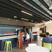 Acoustic beams suspended above the Z Energy office architecture, cafeteria, institution, interior design, table, black