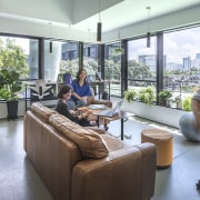 Natural surfaces and ample daylight are key features interior design, gray