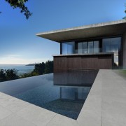 The infinity pool provides the best place to architecture, estate, facade, home, house, property, real estate, reflection, sky, gray, teal