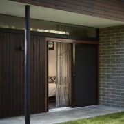 Architect: Architect: Steffen Welsch ArchitectsPhotography: Rhiannon architecture, door, facade, garage door, house, shed, siding, black