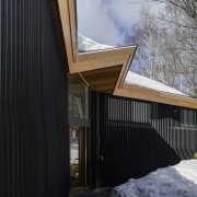 Architect: J.Roc DesignPhotography by James Leng architecture, building, cottage, facade, home, house, real estate, roof, siding, snow, window, winter, wood, black, gray