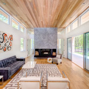 Clerestory windows sit below the wood ceiling, flooding architecture, ceiling, estate, house, interior design, living room, real estate, room, window, gray