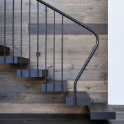 A metal balustrade holds up the staircase - architecture, glass, handrail, iron, stairs, gray, black