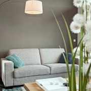 The villas feature tasteful interior appointments - The furniture, home, interior design, living room, room, table, gray