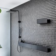 A charcoal faucet and matching shelves complement the architecture, house, wall, window, gray, white