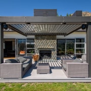 The word ‘relax’ comes to mind with this outdoor structure, real estate, gray