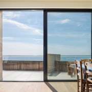 The dining room has uninterrupted views of the apartment, condominium, door, home, house, interior design, penthouse apartment, property, real estate, window, gray, white