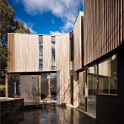 Architect: Steffen Welsch ArchitectsPhotography: Rhiannon Slatter apartment, architecture, building, condominium, facade, home, house, real estate, reflection, residential area, sky, wood, black