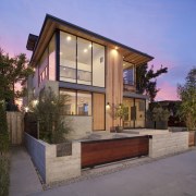 Outside, the home is inviting, with substantial windows architecture, elevation, estate, facade, home, house, property, real estate, residential area, siding, window, gray