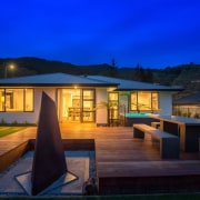 Galaxy's Aquila Star Spa Pool - Nelson - architecture, backyard, cottage, estate, evening, facade, home, house, landscape lighting, lighting, property, real estate, residential area, roof, sky, villa, blue, black