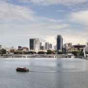 Jubilee Bridge – Cox Architecture - Jubilee Bridge boat, city, cityscape, cloud, condominium, daytime, downtown, metropolis, metropolitan area, reflection, river, sky, skyline, skyscraper, tower block, urban area, water, water transportation, waterway, gray