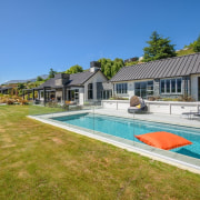 The word ‘relax’ comes to mind with this cottage, estate, home, house, leisure, property, real estate, residential area, swimming pool, villa, teal, brown