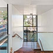 A glass balustrade ensures clean sight lines through architecture, daylighting, door, floor, handrail, home, house, interior design, property, real estate, window, gray