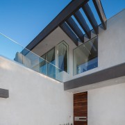 These beams shelter this window - These beams architecture, building, commercial building, corporate headquarters, daylighting, daytime, elevation, estate, facade, home, house, property, real estate, residential area, sky, window, gray
