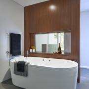 This master suite features standing cabinetry as a bathroom, interior design, room, gray