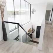 Architect: 2020 ArchitectsPhotography by Reinis Babrovskis architecture, floor, flooring, handrail, home, house, interior design, laminate flooring, loft, property, real estate, stairs, wood flooring, white