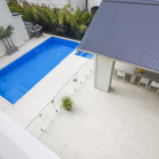 A glass balustrade prevents unwanted access to the architecture, area, daylighting, home, house, property, real estate, residential area, roof, swimming pool, window, white