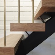 Brass pillars rise up out of the wood angle, architecture, floor, furniture, plywood, product design, shelf, shelving, tap, tile, wall, wood, white