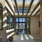 Wood beams break up harsh desert sun - daylighting, estate, interior design, property, real estate, roof, window, black, brown