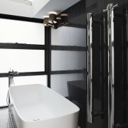 Not over-sized cabinet handles but rather heated towel bathroom, floor, interior design, plumbing fixture, room, black, white