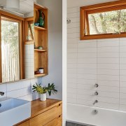 Architect: Kim Irons Photography by Nikole Ramsay bathroom, bathroom accessory, bathroom cabinet, cabinetry, countertop, floor, flooring, home, interior design, room, sink, tile, wall, window, wood, wood stain, gray