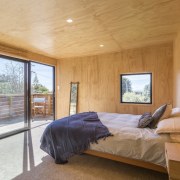 Graham Phipps Tiny House - Ruby Bay, architecture, bedroom, ceiling, daylighting, estate, floor, home, house, interior design, property, real estate, room, window, wood, orange