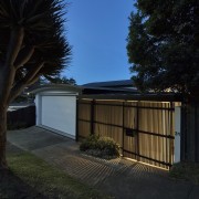 It's certainly a private home from the street architecture, cottage, estate, facade, home, house, lighting, property, real estate, residential area, roof, shed, sky, tree, black