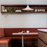 Banquette seating beside kitchen. - Out of the 