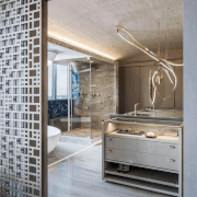 A custom metal screen acts as a privacy 