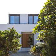 The design presents a formal façade to the 