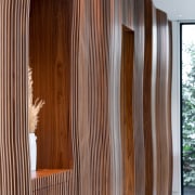 A display niche sits within the curvaceous batten 