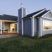 Dusk falls on the couple's dream lakeside home 