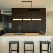The two-tone kitchen approach was carefully considered to 