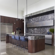 The tall kitchen has a dramatic presence. - 