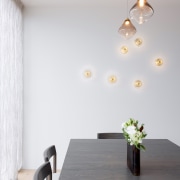 Relaxing dining room with feature Soktas pendant. 