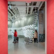 Photo by Michel Florent - Discover BIG’s retail architecture, building, interior design, red, room, red, gray
